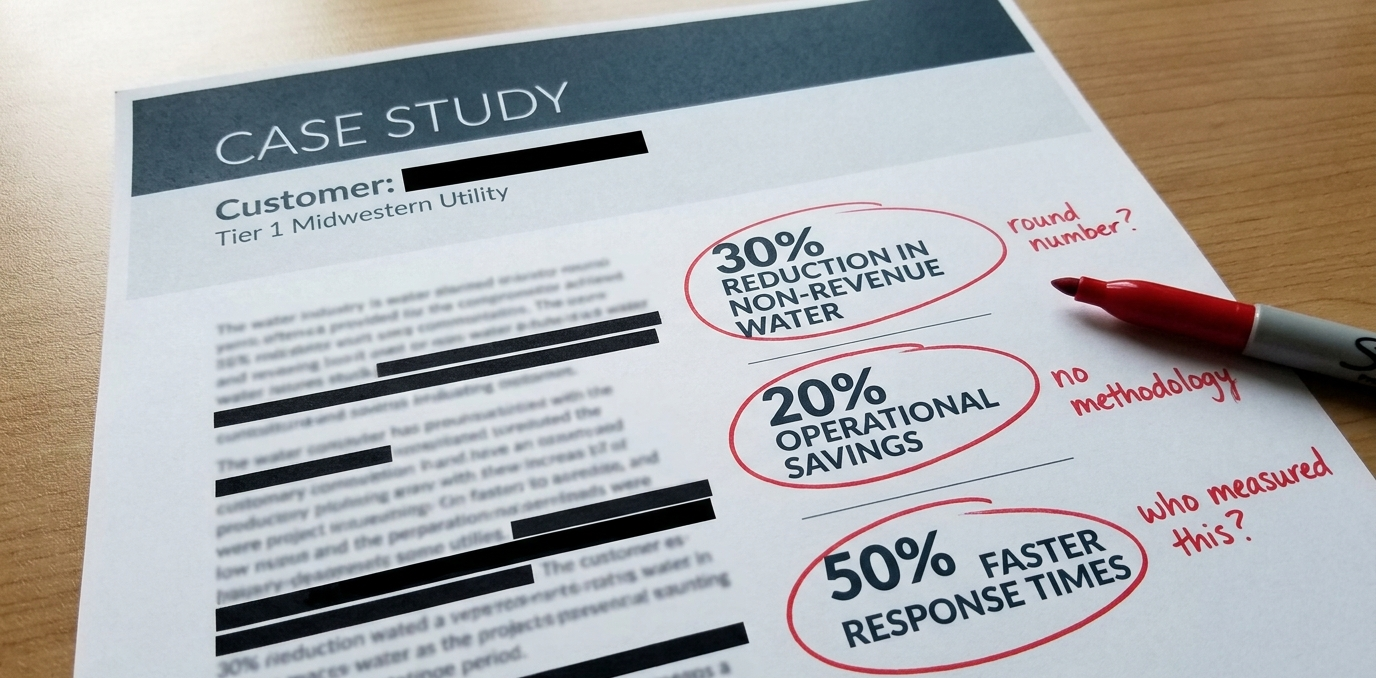 A printed water industry case study page on a wooden desk, with the customer name redacted to "Tier 1 Midwestern Utility" and three round-number callouts (30% reduction in non-revenue water, 20% operational savings, 50% faster response times) circled in red marker with handwritten annotations reading "round number?", "no methodology", and "who measured this?"